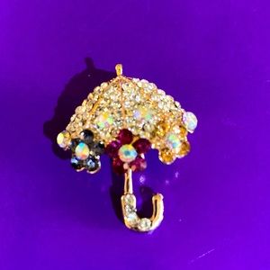 Umbrella brooch/pin with rose tones and 3 flowers with colorful rhinestones